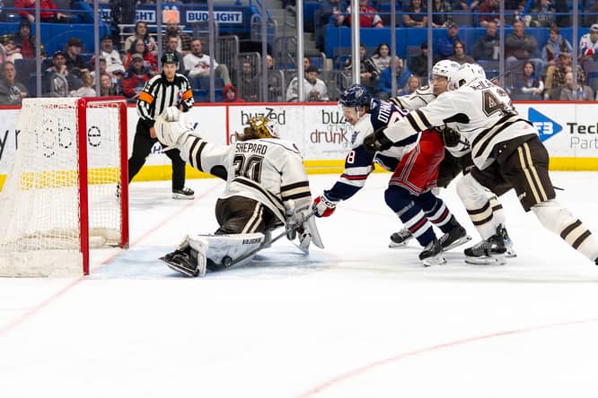 Hartford Wolf Pack's Brennan Othmann in action