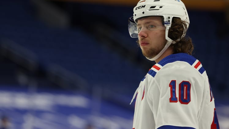 Apr 1, 2021; Buffalo, New York, USA; New York Rangers left wing Artemi Panarin (10) on the ice for warmups before a game against the Buffalo Sabres at KeyBank Center. Mandatory Credit: Timothy T. Ludwig-USA TODAY Sports