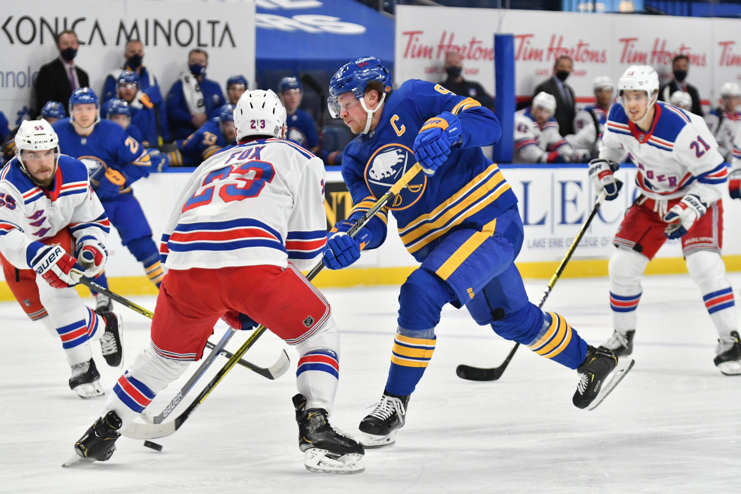 Jack Quinn of the Buffalo Sabres is defended by Igor Shesterkin