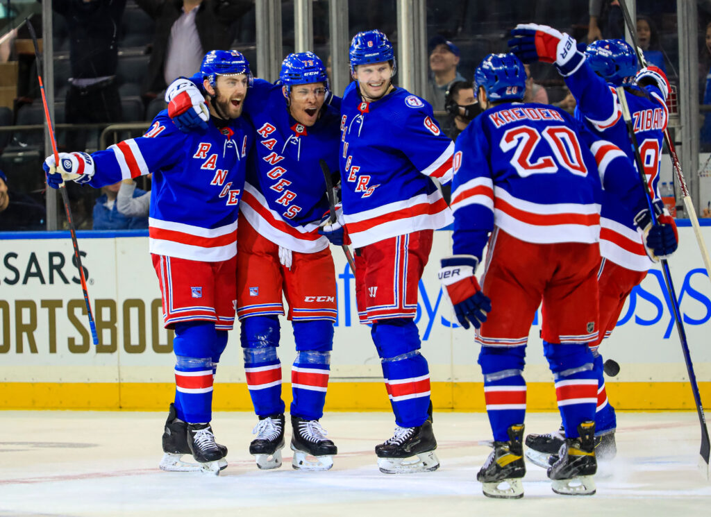 Artemi Panarin and Jacob Trouba of the New York Rangers discuss