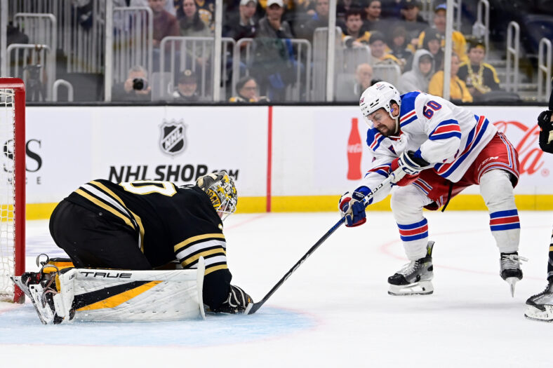 New York Rangers' Braden Schneider plays against the Boston Bruins